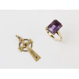 An amethyst set 9ct gold ring, comprising a rectangular emerald cut amethyst, measuring 12mm x