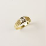 An 18ct gold diamond solitaire ring, comprising a central round brilliant cut diamond weighing