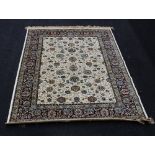 An ivory ground kashmir carpet, with all over floral design, 170cm x 120cm