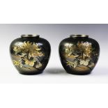 A pair of Japanese patinated bronze parcel gilt vases, 20th century, each decorated with