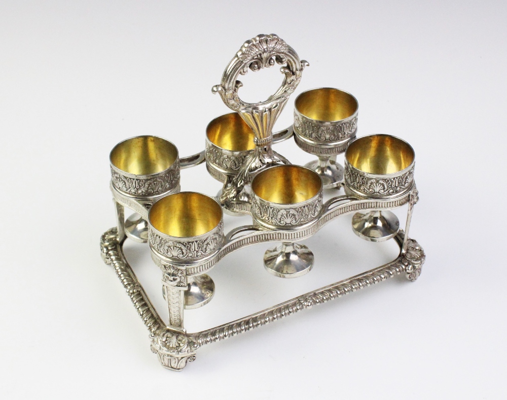 A George III silver egg cruet by Phillip Rundell, London 1819, the rectangular stand with - Image 3 of 6