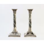 A pair of Victorian silver candlesticks by Hawksworth, Eyre & Co Ltd, Sheffield 1896, each