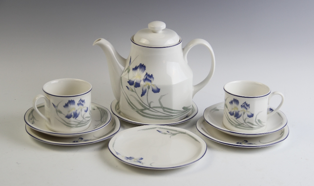 A Royal Doulton Minerva pattern four setting tea service, comprising: a teapot, four tea cups,