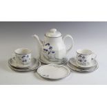 A Royal Doulton Minerva pattern four setting tea service, comprising: a teapot, four tea cups,