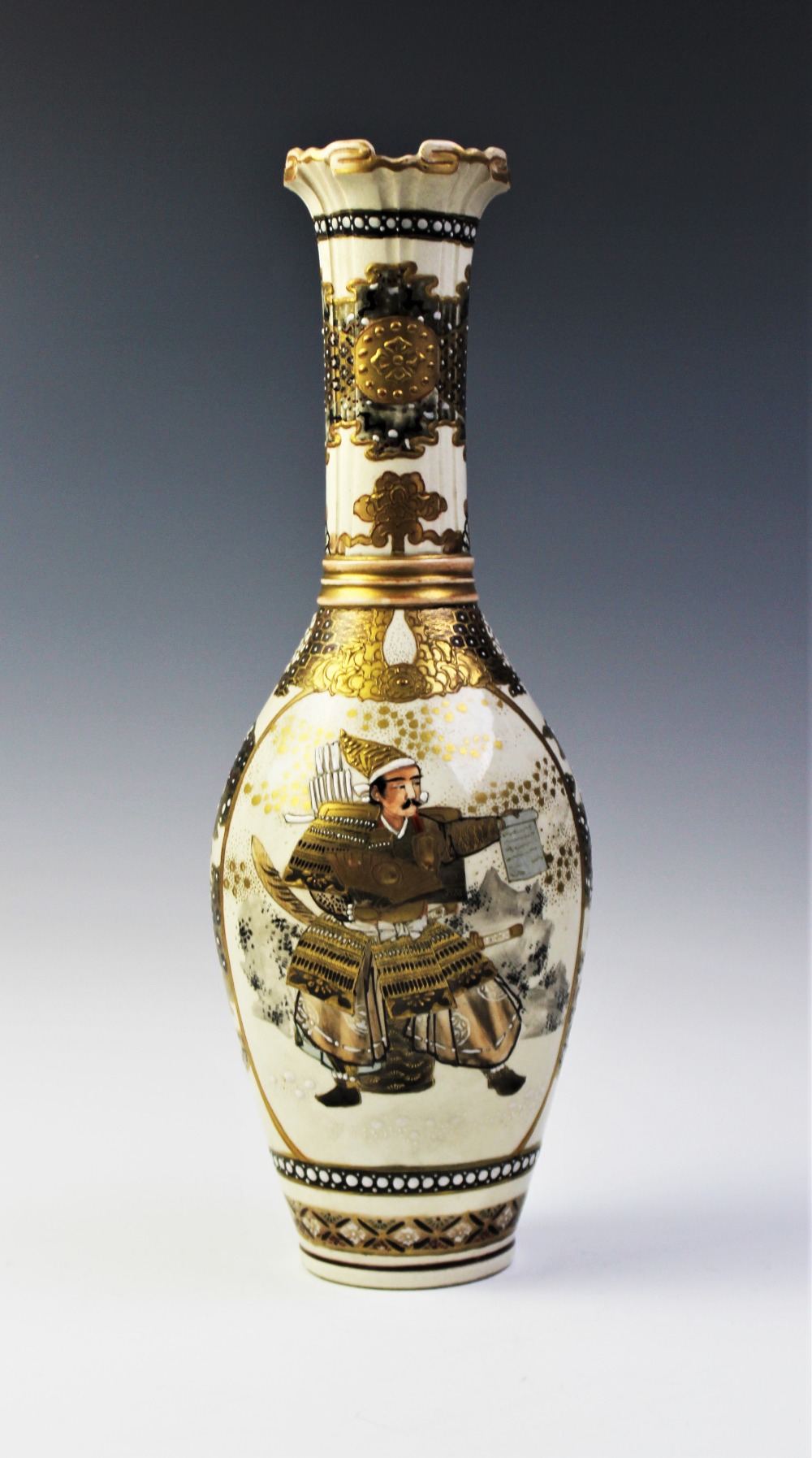 A Japanese Satsuma vase, signed Nishida Kyoto, Meiji period (1868 - 1912), the slender cylindrical