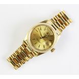 A gentleman's 18ct gold Rolex Oyster Perpetual Day-Date wristwatch, the round gold-toned dial with
