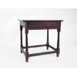 An 18th century oak side table, the rectangular top with a moulded border and rounded corners, above