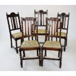 A matched set of eight 1930's oak dining chairs (4+4), each chair with a drop in seat raised upon