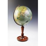 A 12" terrestrial globe titled 'Columbus Erdglobus', C.Luther cartographer upon observations by