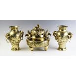 A Chinese polished bronze koro and cover, early 20th century, extensively decorated to the