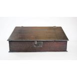A late 17th century oak bible or document box, the moulded rectangular slope applied with iron