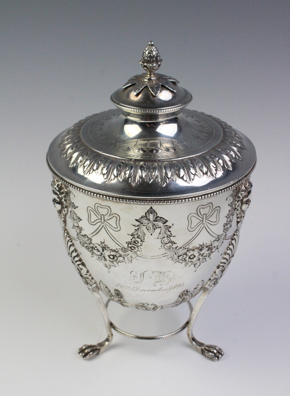 A late Victorian silver caddy by Martin, Hall & Co, Sheffield 1893, the urn shaped body resting on - Image 2 of 7