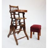 A Victorian child's metamorphic beech wood high chair, with turned spindles above a pivoted half