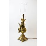 A cast brass table lamp, 20th century, cast in the form of a two handled urn with cherub, upon a