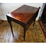 An early 19th century mahogany Pembroke table, with a single frieze drawer opposed by a faux drawer,