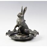 A 19th century novelty pewter hare figural inkwell, stamped 'J R & S' possibly John Round & Son,