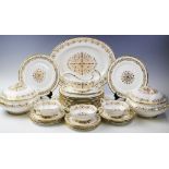 A Tuscan Richelieu pattern part dinner service, comprising; two tureens and cover, a sauce boat