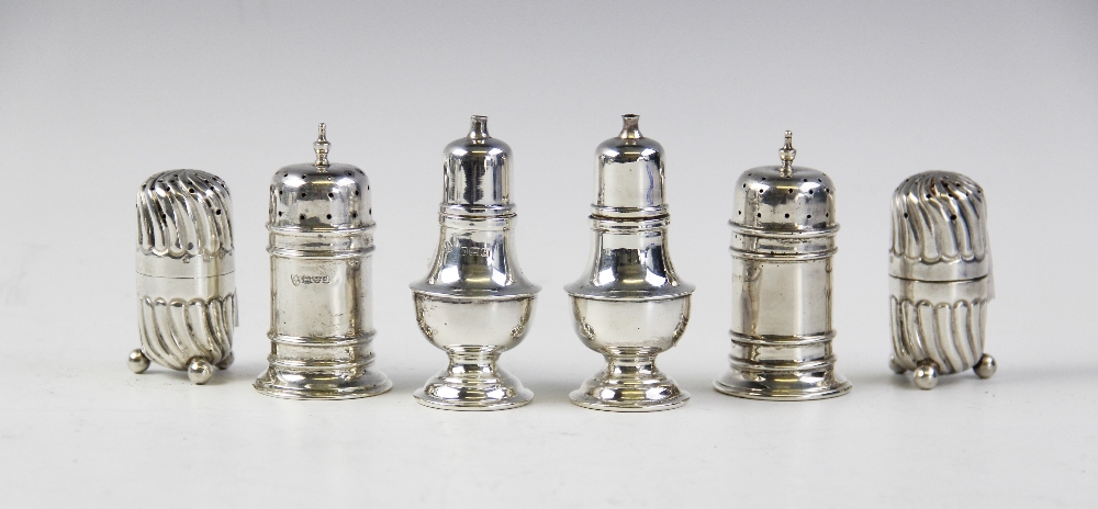 A pair of silver pepperettes by Adie Brothers, Birmingham 1936-37, of baluster form on stepped