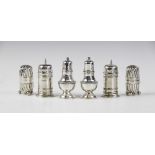 A pair of silver pepperettes by Adie Brothers, Birmingham 1936-37, of baluster form on stepped