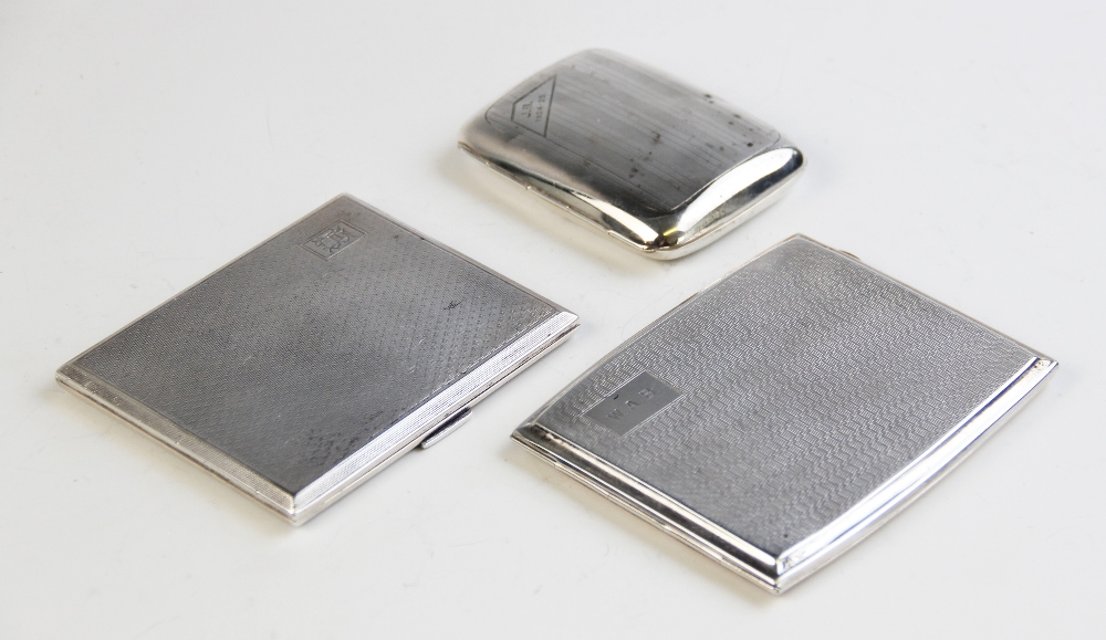 A George V silver cigarette case by S J Rose & Son, Birmingham 1931, of rectangular form with engine