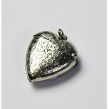 A Victorian heart-shaped vesta case by Albert Sydenham, Birmingham 1899, with engraved foliate