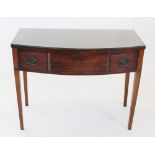 A George III mahogany bow front mahogany side table, with an arrangement of three frieze drawers,