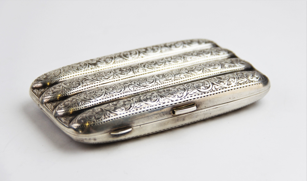 A George V silver cigar case by John Rose, Birmingham 1913, of typical form with scrolling foliate