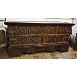 A 19th century Eastern European painted folk art pine chest, painted with geometric designs, the