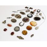 A selection of Victorian and later brooches and pendants, to include a Victorian blue john set
