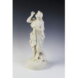A Parian ware figure of a flower picker, modelled standing with her hand aloft smelling a flower,