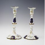 A pair of mid-18th century Georgian Bilston enamelled copper candlesticks, circa 1765, each of