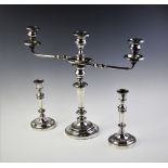 A pair of silver plated Christofle candlesticks, each stamped '7', each 20.5cm high, together with a