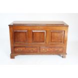 A George III oak and mahogany cross banded mule chest, the rectangular moulded top above three