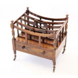 A rosewood Canterbury, 19th century, of typical form with five curved division rails to the top, the