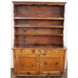 A 19th century pine kitchen dresser, the associated high back with three shelves upon a base with