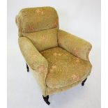 A Victorian club chair, later re-covered with green foliate fabric and rope edging, the deep set