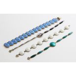 A collection of four Scandinavian silver and enamel bracelets, comprising a bracelet with central