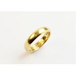An 18ct gold wedding band, ring size L, weight approx. 5.4gms