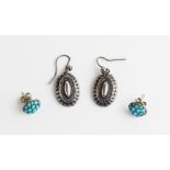A pair of Victorian silver drop earrings, each designed as an oval drop with beaded detail and