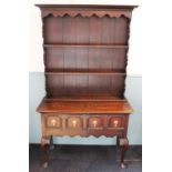 A 17th century style oak Welsh dresser, late 19th/early 20th century, of cottage proportions, the