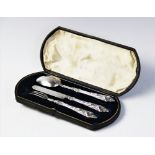 A Victorian silver christening set comprising a spoon, fork and knife by George Unite & Sons,