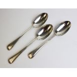 Three silver serving spoons by Goldsmiths & Silversmiths Company, London 1923, each with initial 'D'