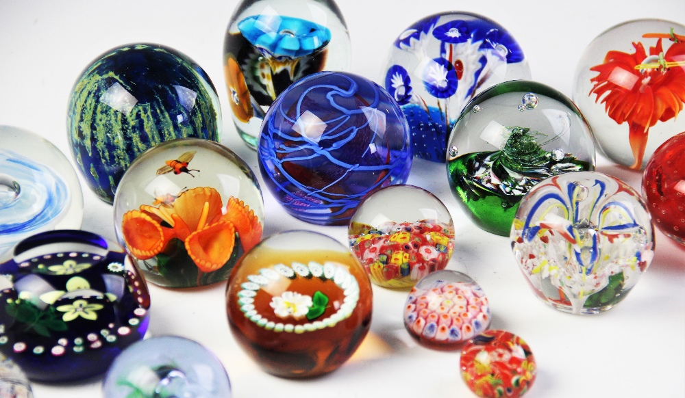 A collection of twenty one paperweights, 20th century, by Caithness, Selkirk, Strathearn, Murano and