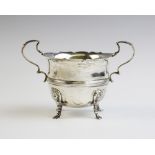 An Edwardian silver sugar by John Millward Banks, Chester 1908, plain polished with shaped rim and