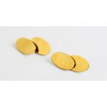 A pair of 9ct gold cufflinks, comprising plain polished oval panels, each measuring 20mm x 13mm,