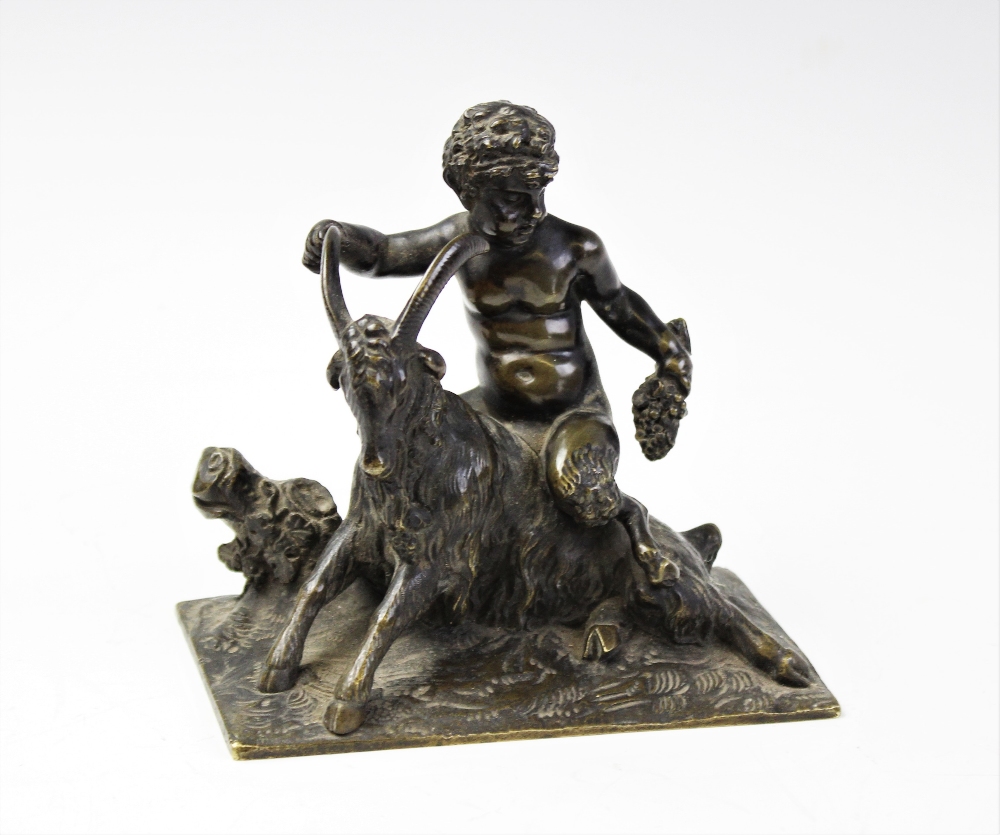 A Grand Tour bronze model of the Infant Bacchus and a goat, 19th century, realistically modelled
