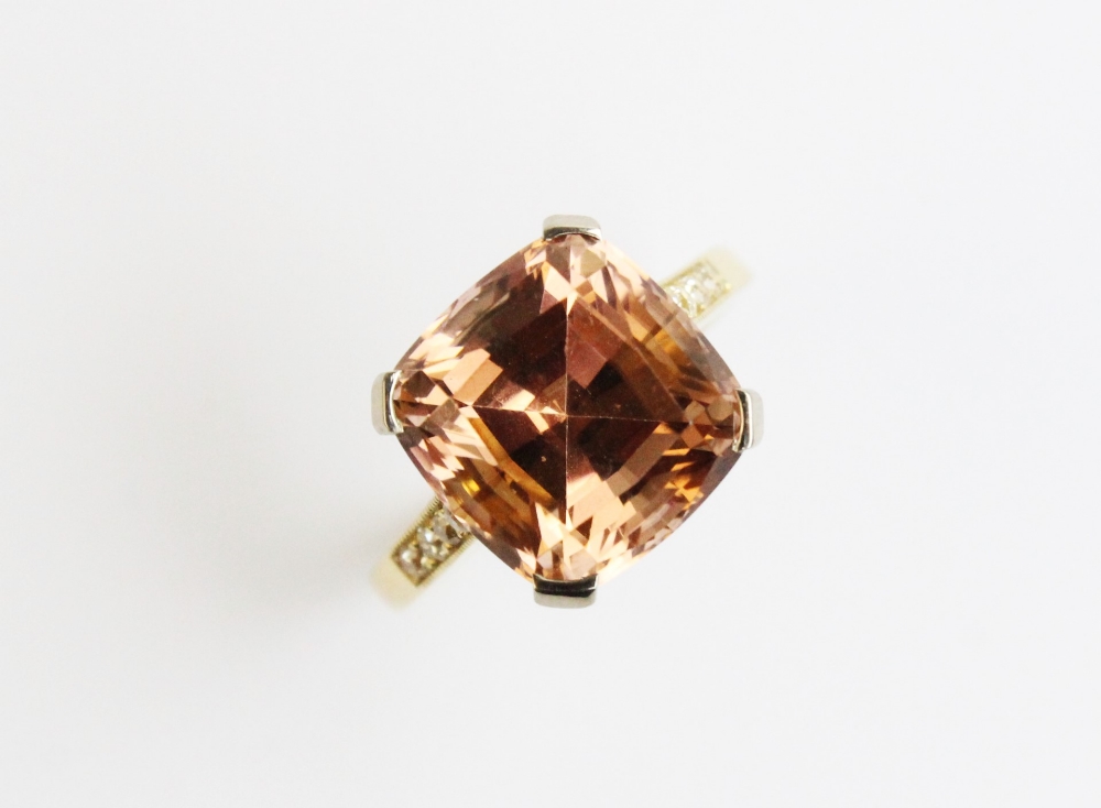 A tourmaline and diamond ring, comprising a central pinkish-orange square cushion cut tourmaline - Image 2 of 8