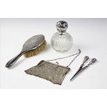 A selection of lady's dressing table wares and accessories, to include a George V silver mesh
