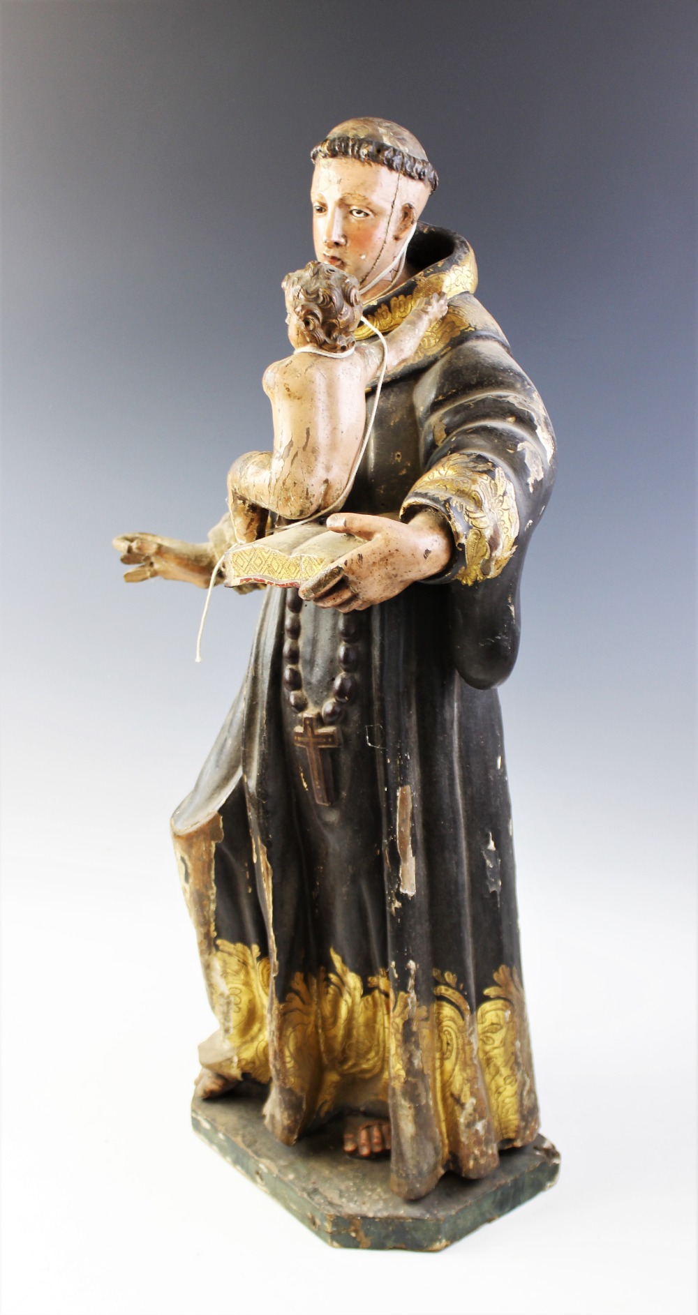 An Italian carved painted wood and gesso figural carving of St. Anthony of Padua and Infant - Image 3 of 3