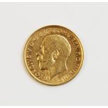 A George V gold half sovereign, dated 1911, weight 3.9gms